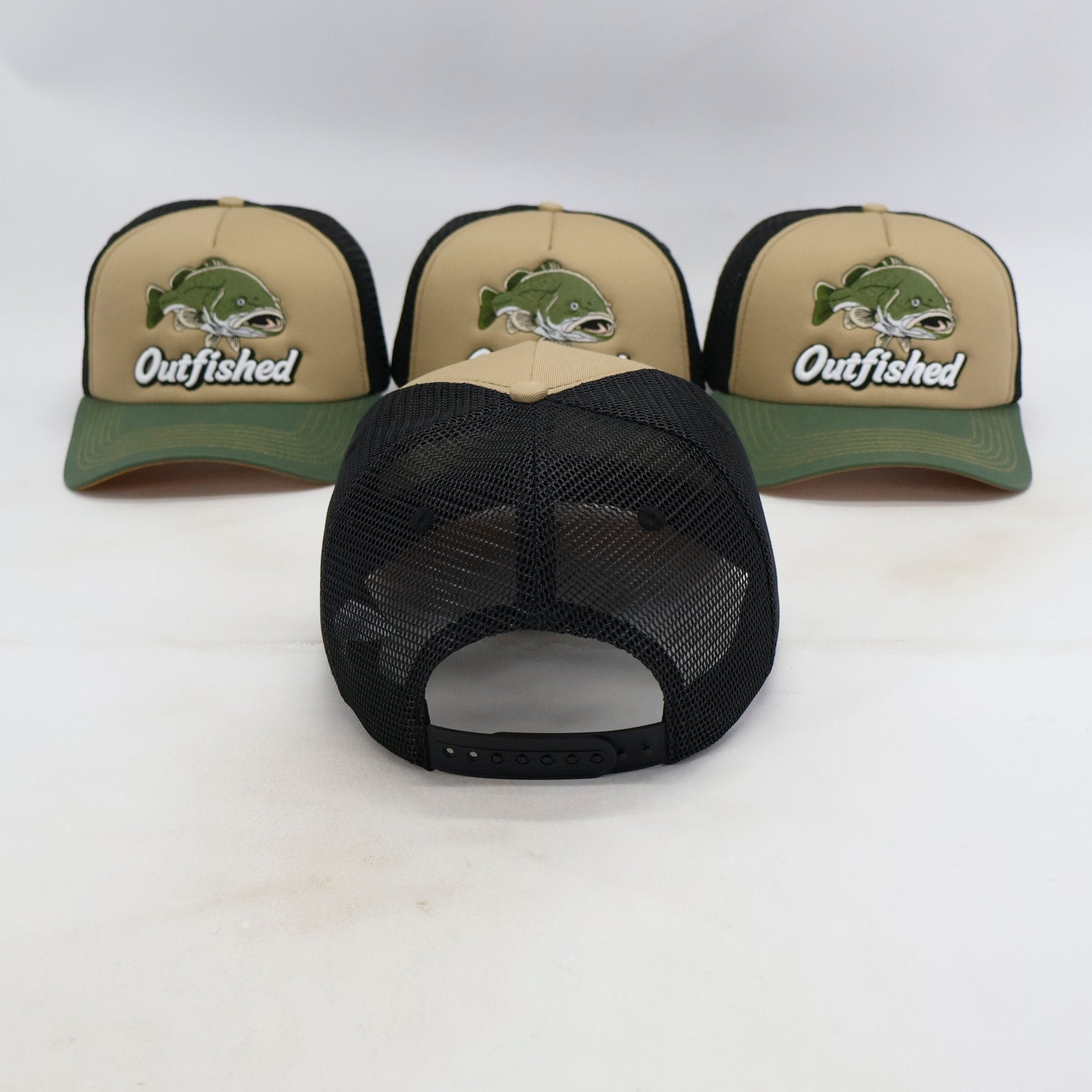 Three Goodoo Murray cod fishing trucker caps showing breathable mesh backs