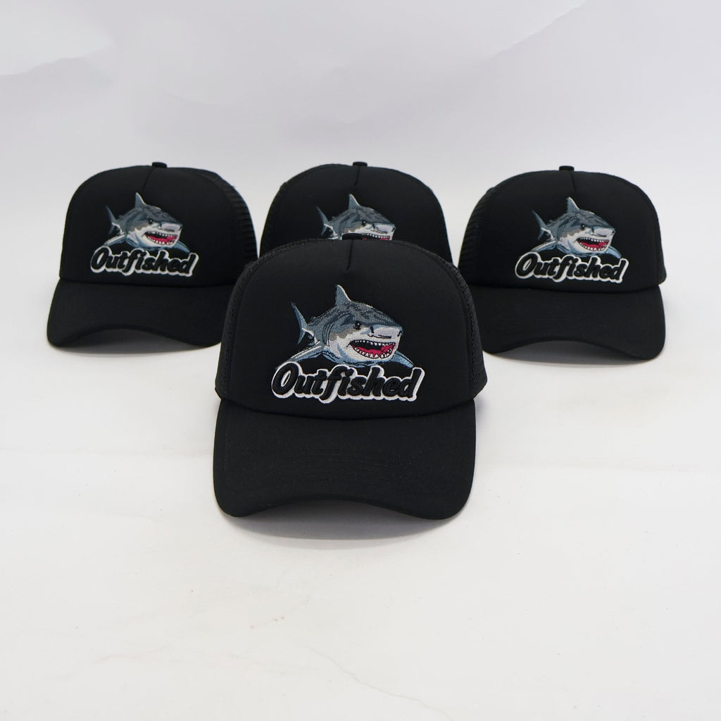 Three Noah bull shark fishing trucker caps with embroidered shark artwork